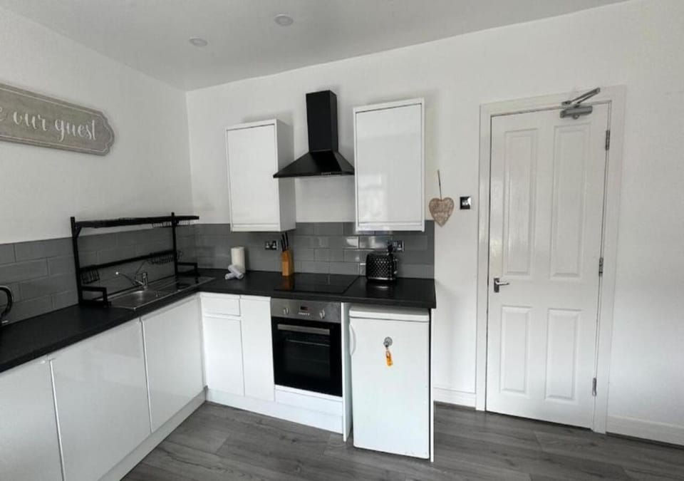 Kitchen or kitchenette, oven, stove, toaster