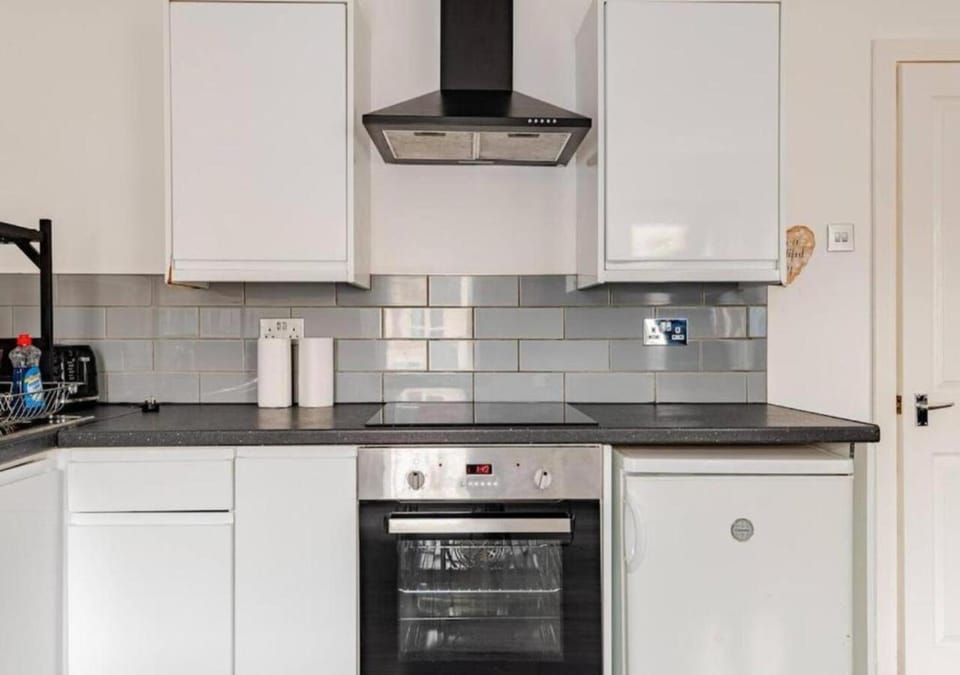 Kitchen or kitchenette, oven, stove
