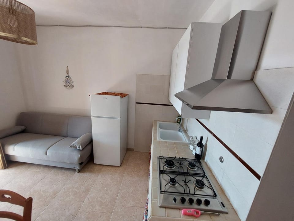 Kitchen or kitchenette, Living room, Seating area, stove