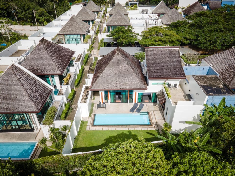 Property building, Patio, Day, Neighbourhood, Bird's eye view, Balcony/Terrace, Text overlay, Pool view, Swimming pool
