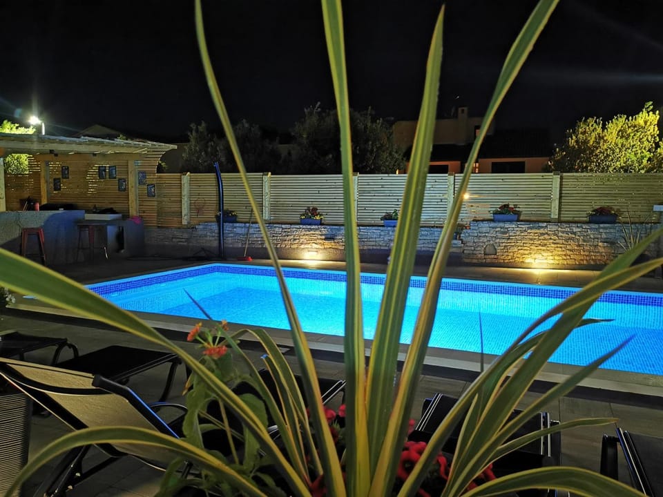Night, Pool view, Swimming pool, sunbed