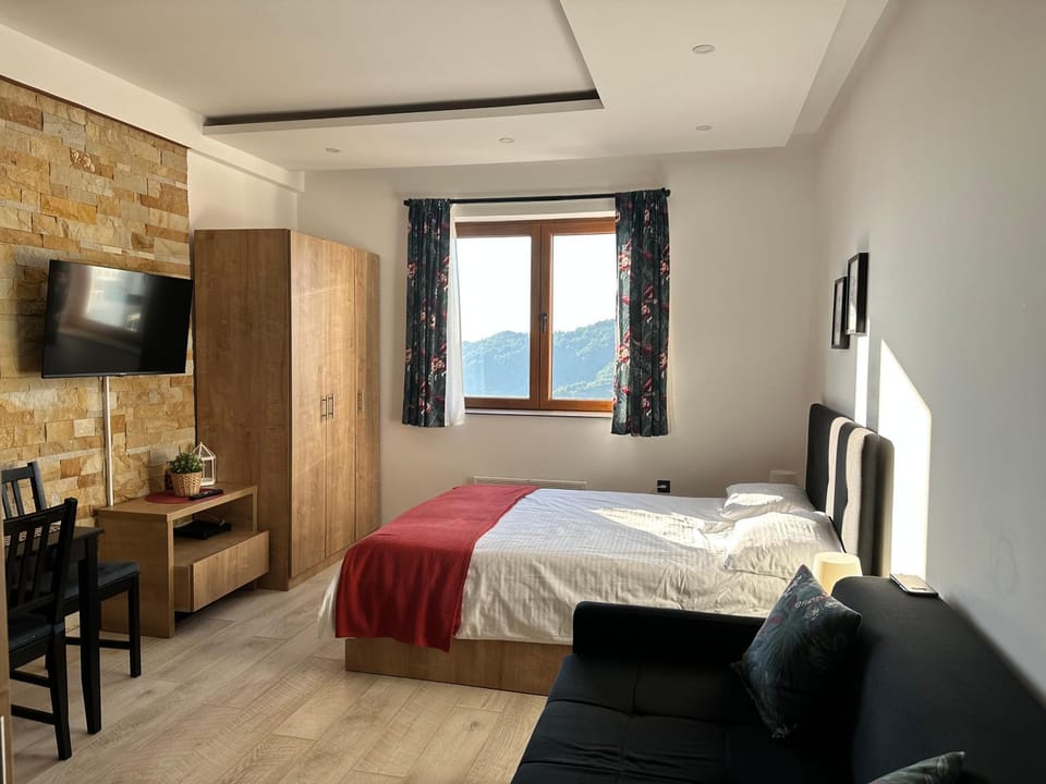 Communal lounge/ TV room, Bed, TV and multimedia, Living room, Photo of the whole room, Seating area, Evening entertainment, Bedroom, hair dresser, wardrobe
