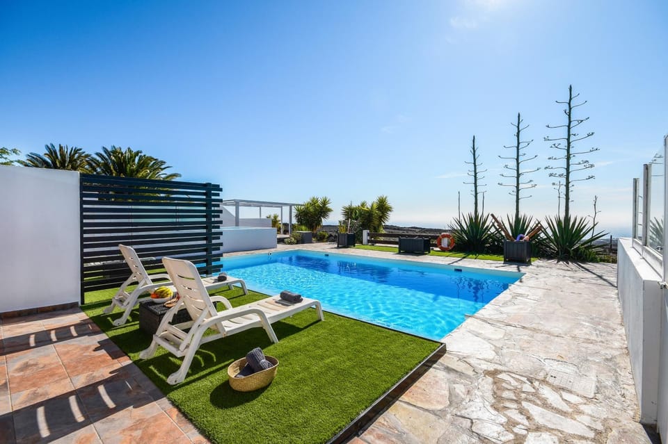 Property building, Living room, Swimming pool