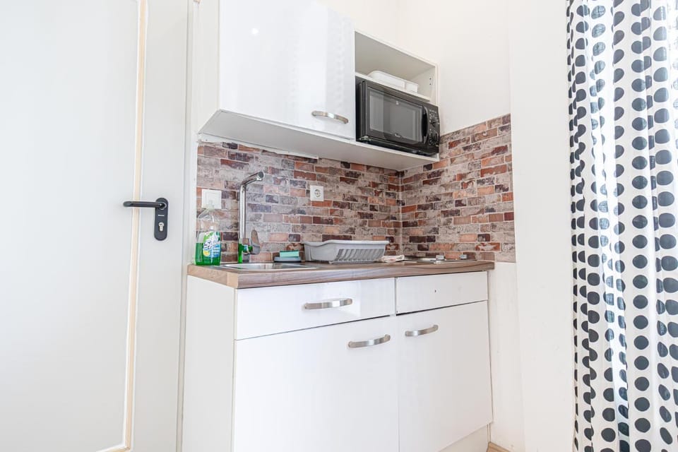 Kitchen or kitchenette, stove