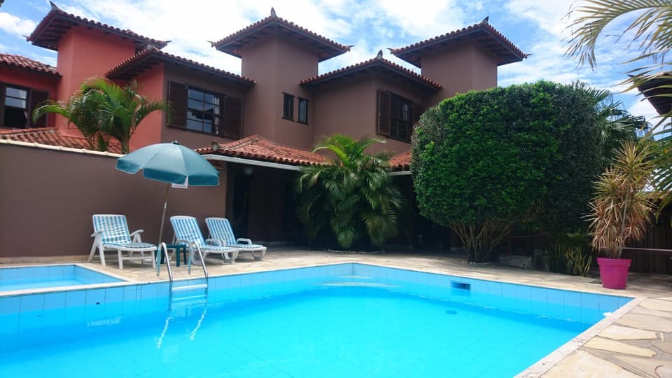 Property building, Day, Pool view, Swimming pool, sunbed
