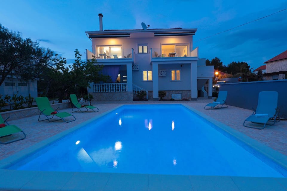 Property building, Swimming pool, Sunset