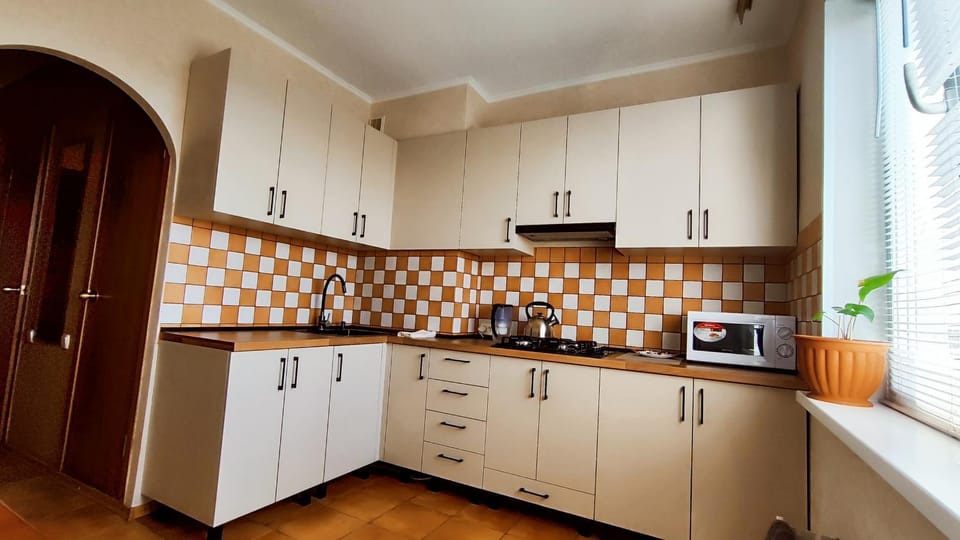 Kitchen or kitchenette, stove