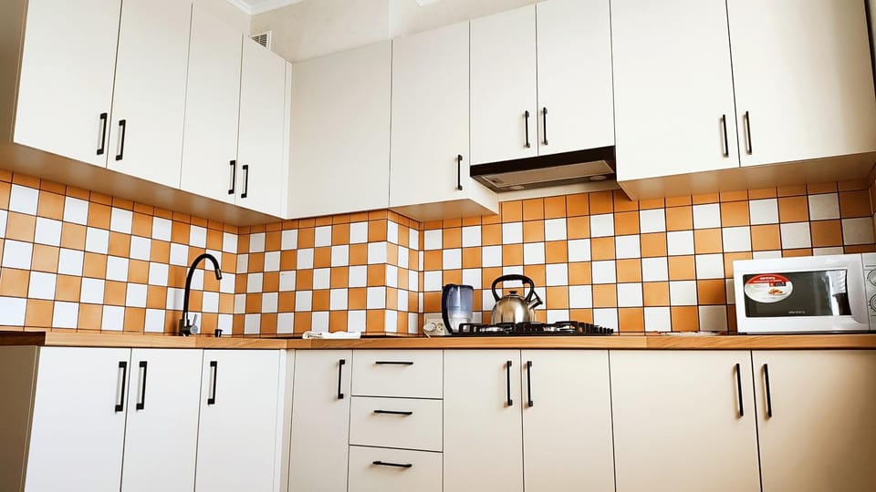 Kitchen or kitchenette, stove