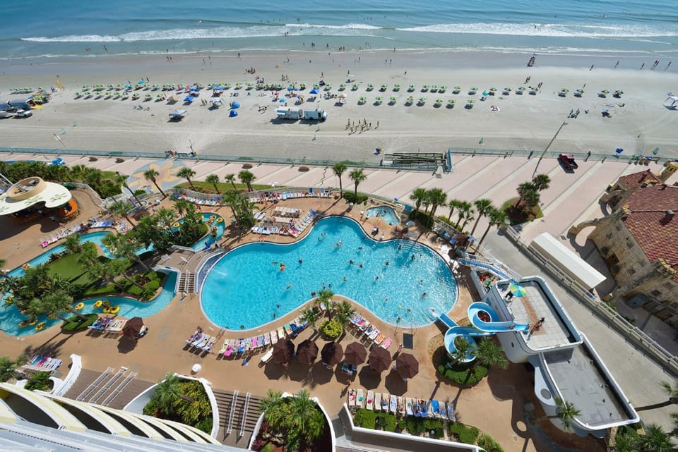 Property building, Beach, Pool view, Sea view, Swimming pool, sunbed