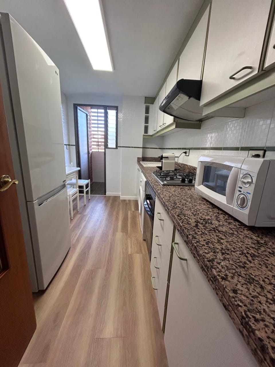 Kitchen or kitchenette, microwave, oven