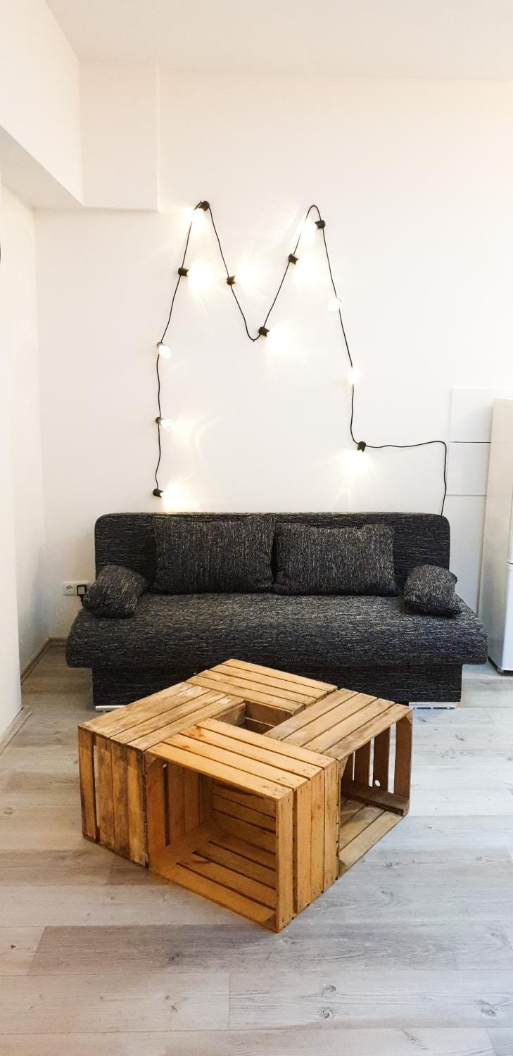 Bed, Living room, Photo of the whole room, Decorative detail, Decorative detail, Seating area