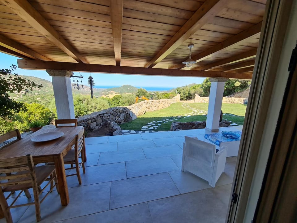 Property building, Patio, Natural landscape, View (from property/room), Balcony/Terrace, Dining area, Mountain view, Sea view