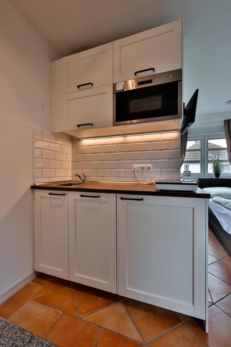 Kitchen or kitchenette, stove, kitchen