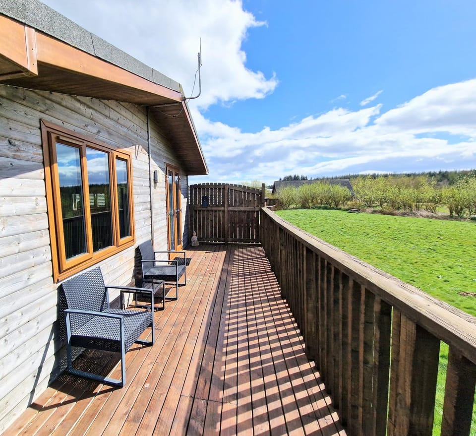 Property building, Patio, Natural landscape, View (from property/room), Seating area