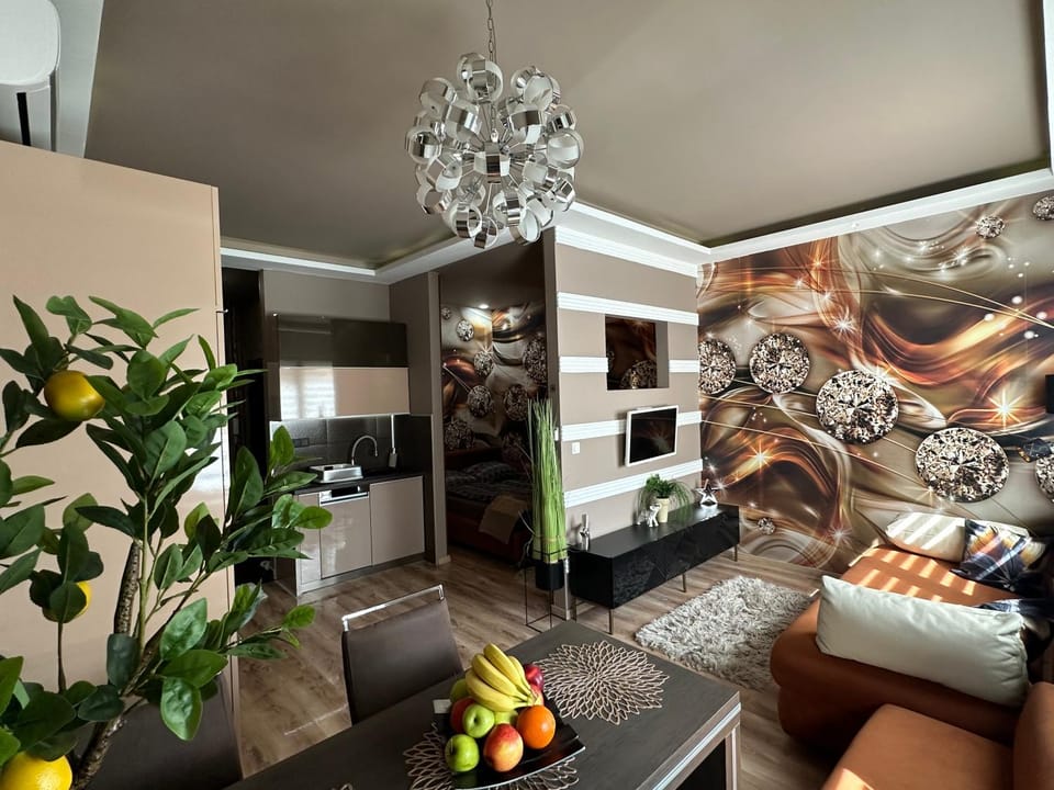 Bed, TV and multimedia, Kitchen or kitchenette, Living room, Photo of the whole room