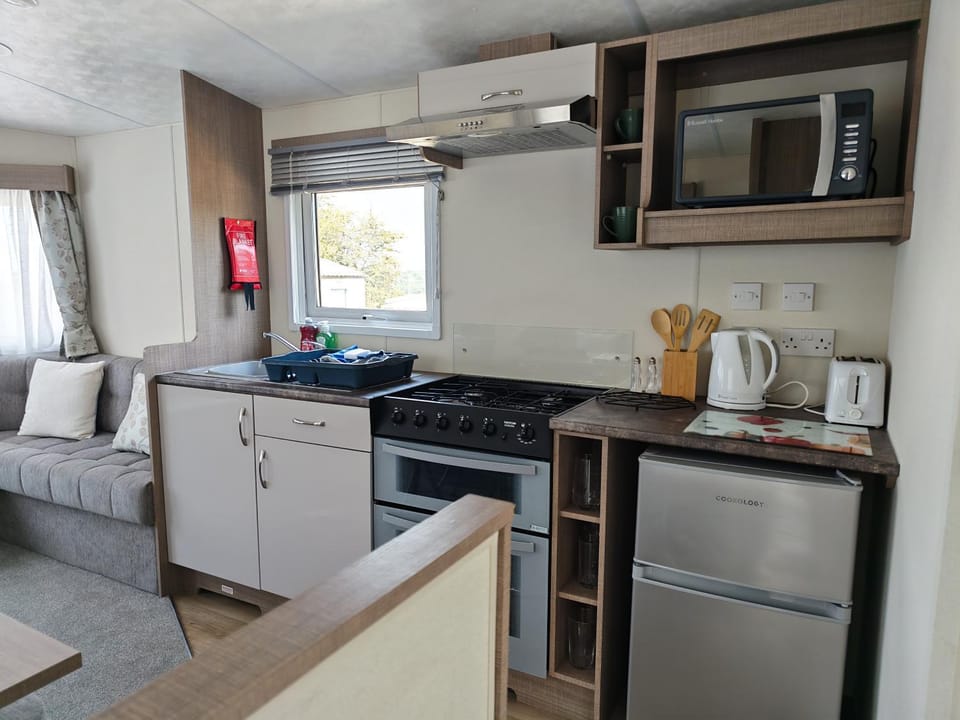 Kitchen or kitchenette, oven, stove, toaster