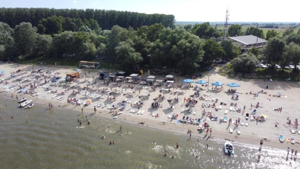 Day, People, Natural landscape, Bird's eye view, Beach, River view, group of guests, sunbed