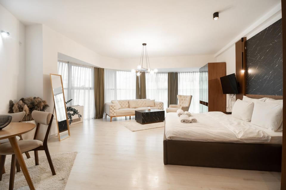 Bed, TV and multimedia, Living room, Photo of the whole room, Seating area