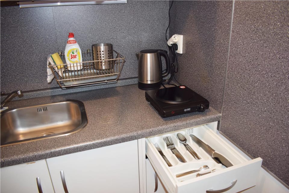 Kitchen or kitchenette, stove
