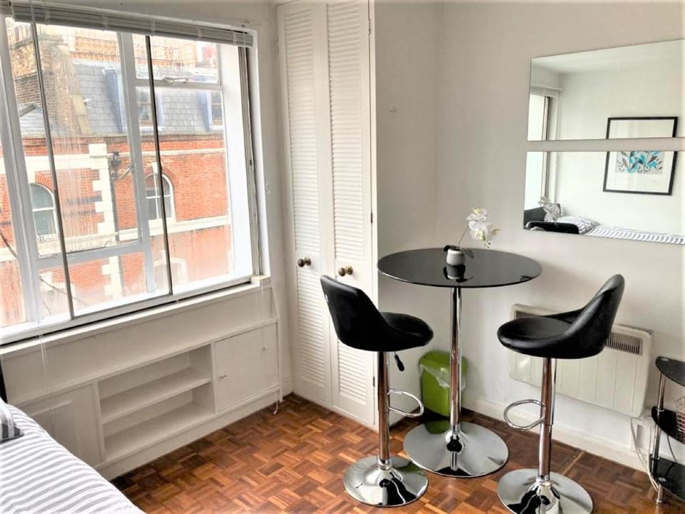 Photo of the whole room, Seating area, Dining area