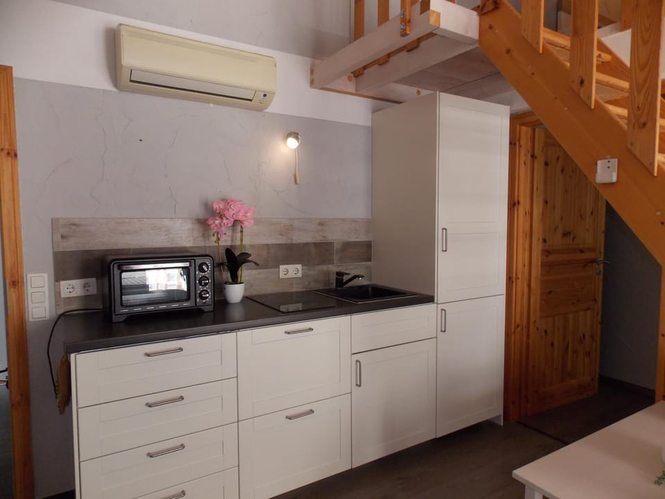 Kitchen or kitchenette, stove