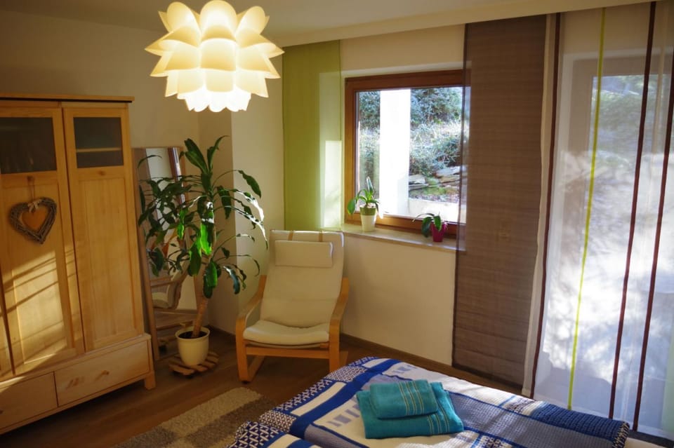 Bed, Seating area, Bedroom