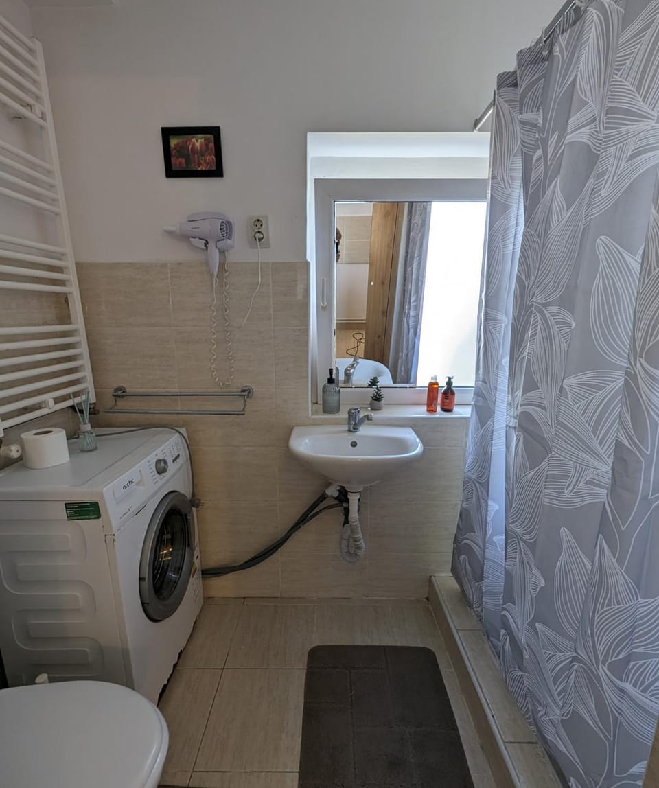 Bathroom, towels, washing machine, dryer