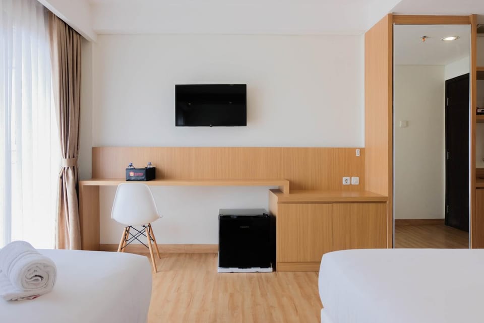 Twin Bed Studio Room at Annora Living Apartment By Travelio Apartment in West Java