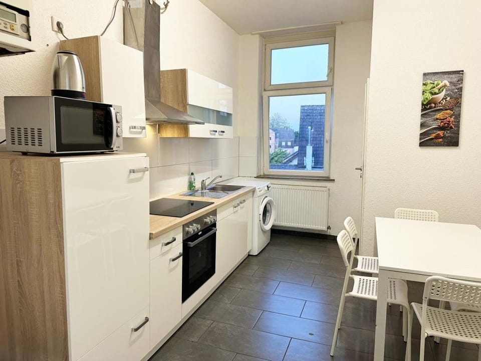 Kitchen or kitchenette, oven, stove