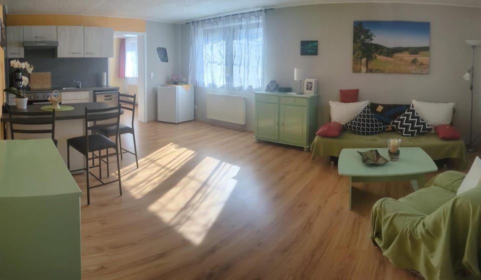 Kitchen or kitchenette, Living room, Seating area, Dining area