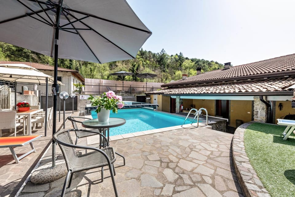 Property building, Living room, Swimming pool