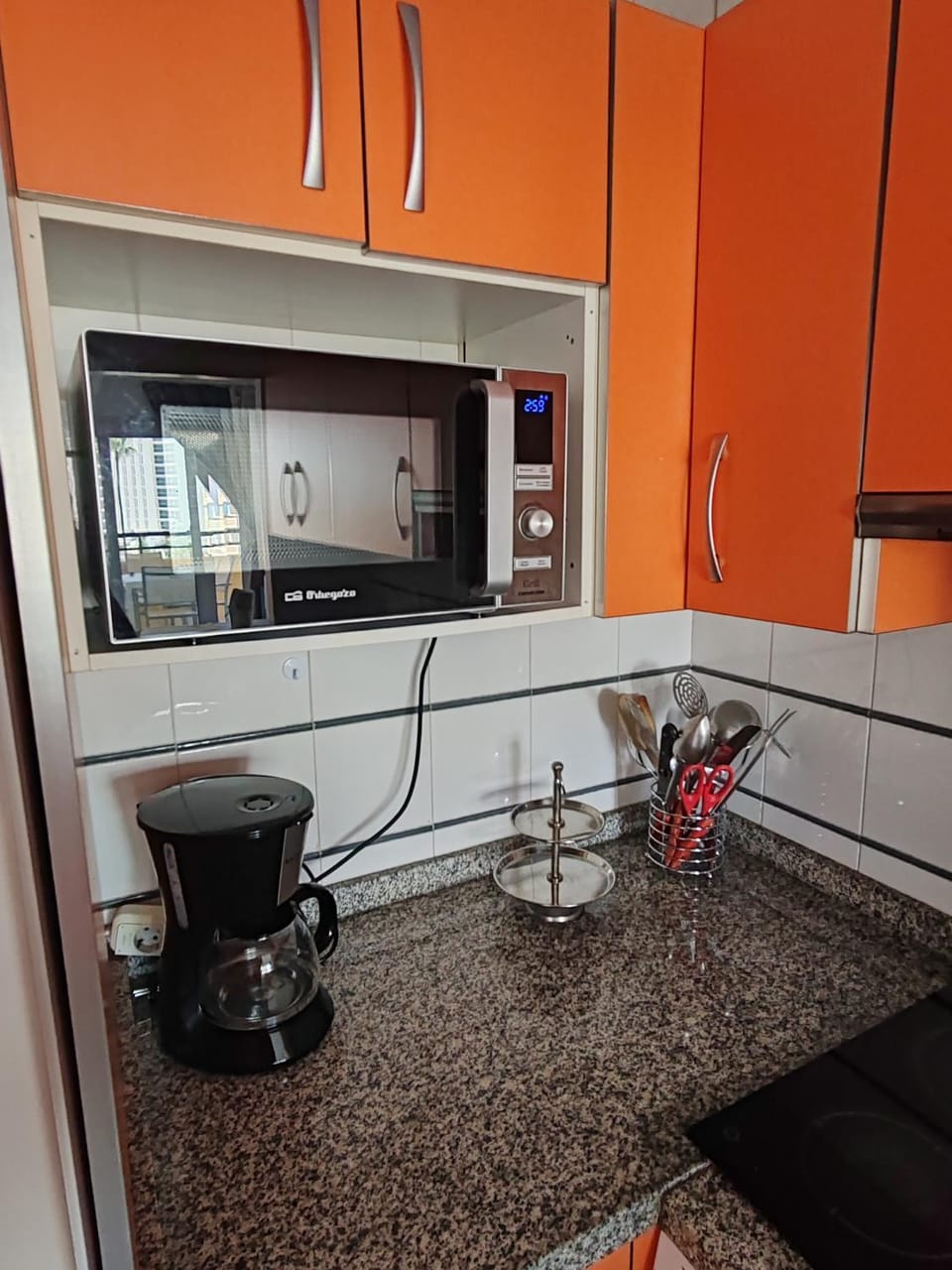 Kitchen or kitchenette, microwave, oven