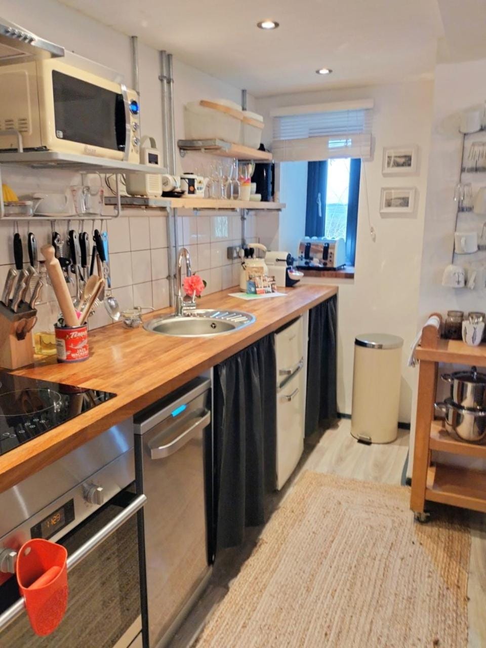 Kitchen or kitchenette, dishwasher, oven, stove, toaster