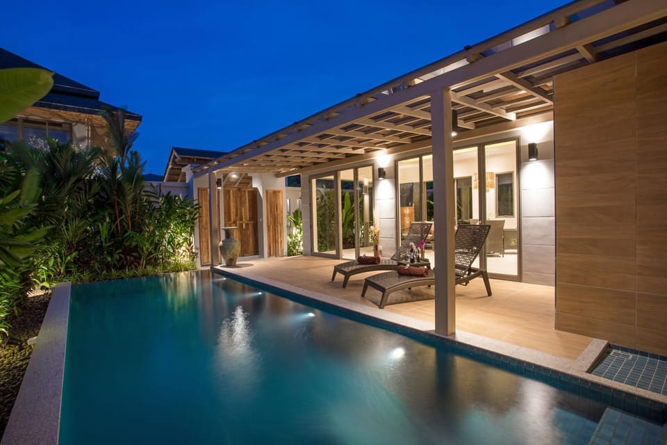 Property building, Night, Swimming pool, Swimming pool, sunbed