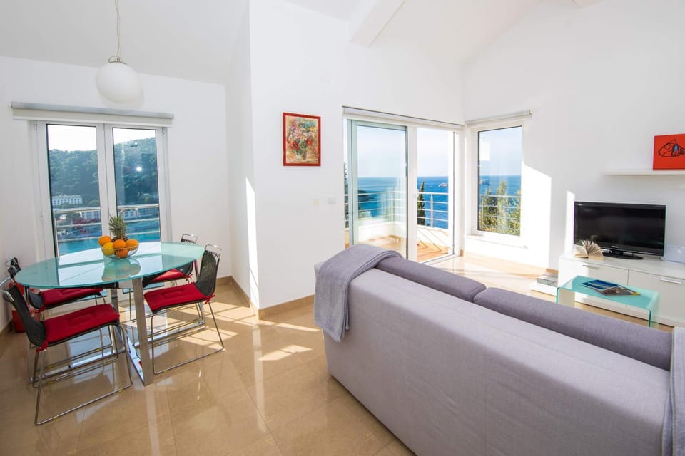 Living room, Seating area, Dining area, Sea view