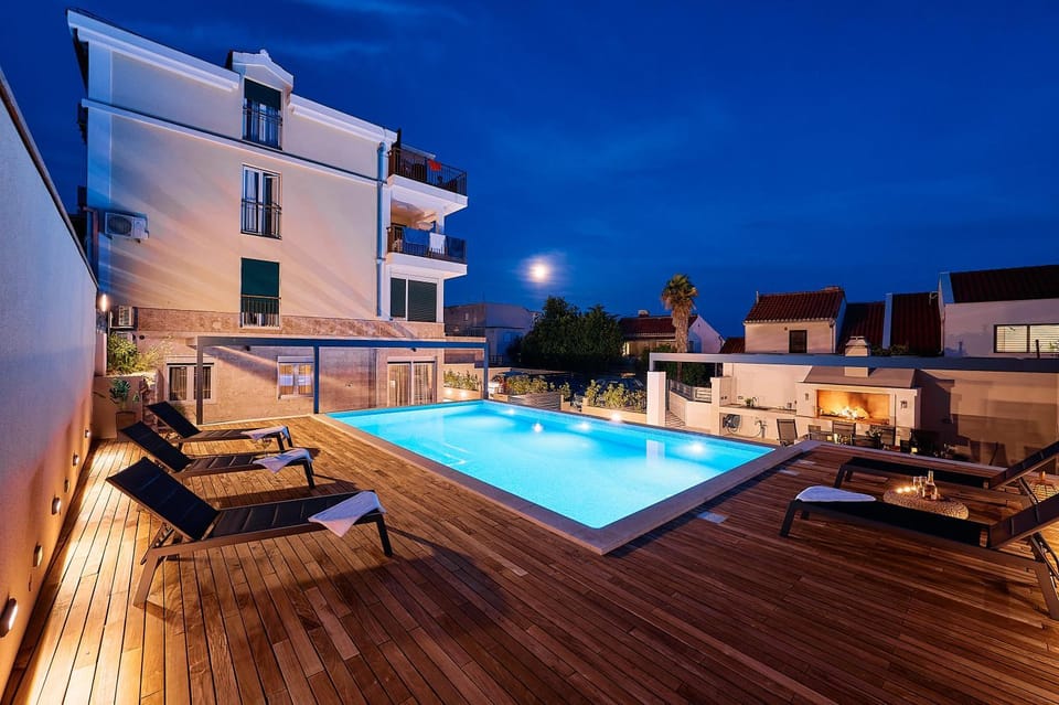 Property building, Pool view, Swimming pool, Sunset, sunbed