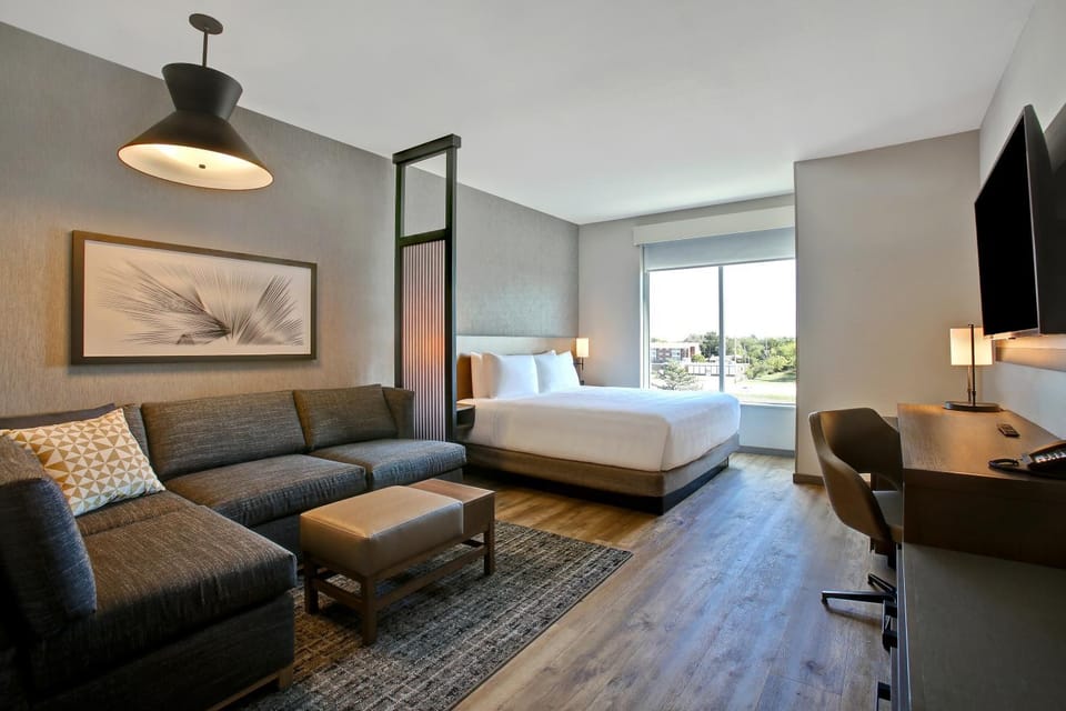 Bed, Living room, Seating area, Bedroom