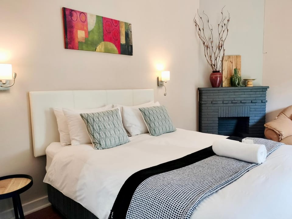Bed, fireplace