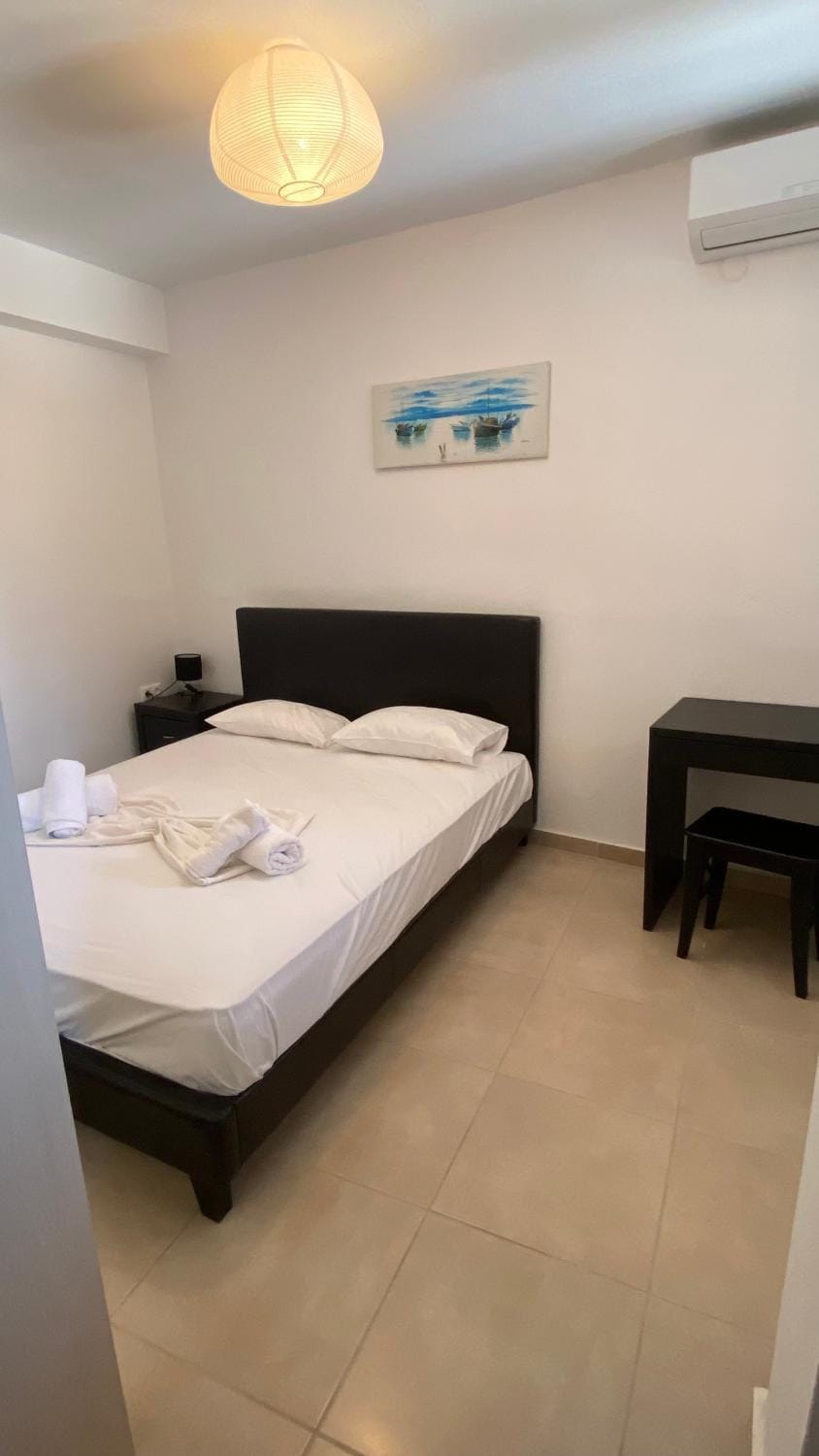 Bed, Photo of the whole room, Bedroom, towels, air conditioner