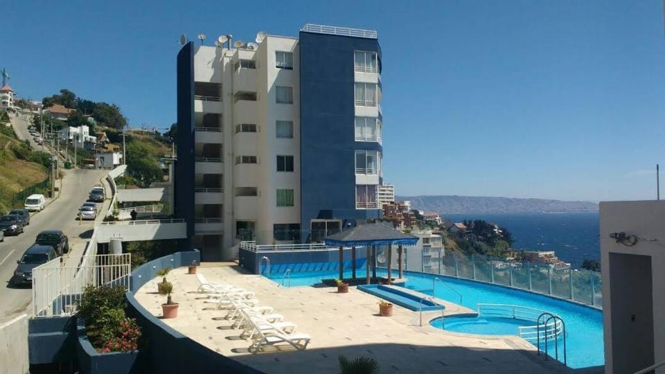 Property building, Day, Natural landscape, Pool view, Sea view, Swimming pool, sunbed
