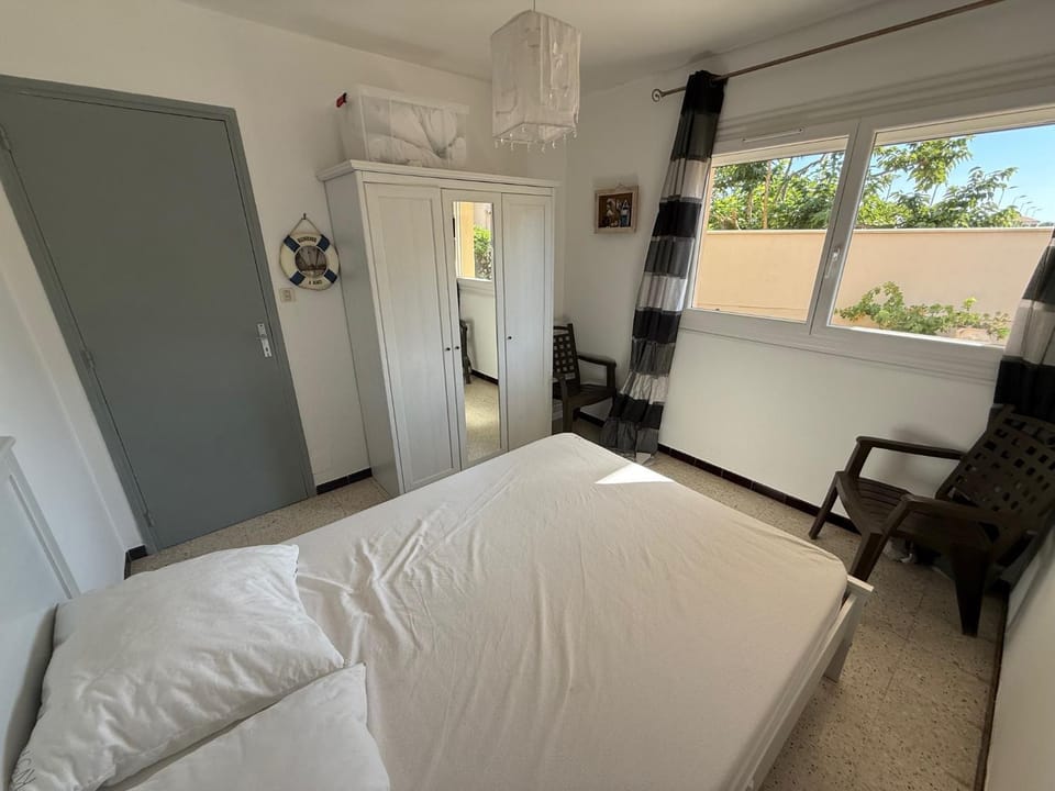 80m de la plage Appartement au rdc d'une maison 1 chambre 4 couchages cour LXRV9A Apartment in Portiragnes