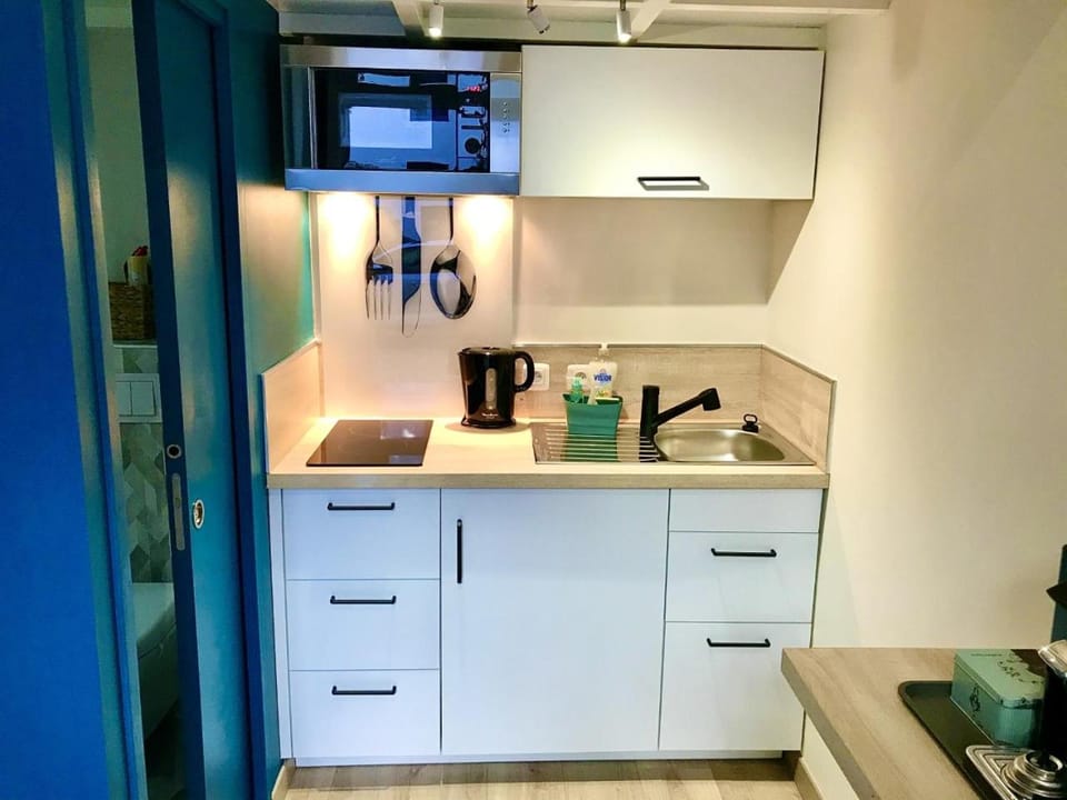 Kitchen or kitchenette, stove