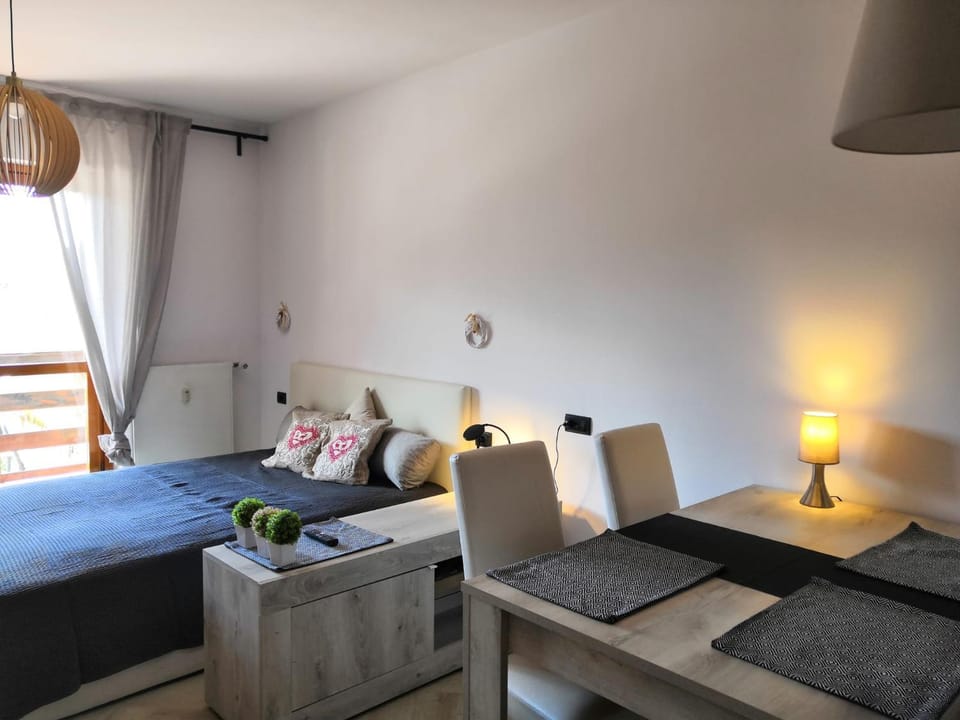 Bed, Living room, Seating area