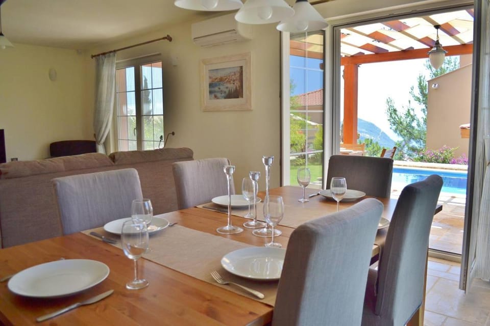 Living room, Seating area, Dining area, Pool view, Swimming pool