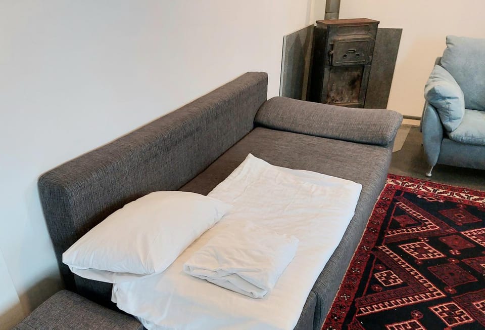 Bed, Living room, Seating area