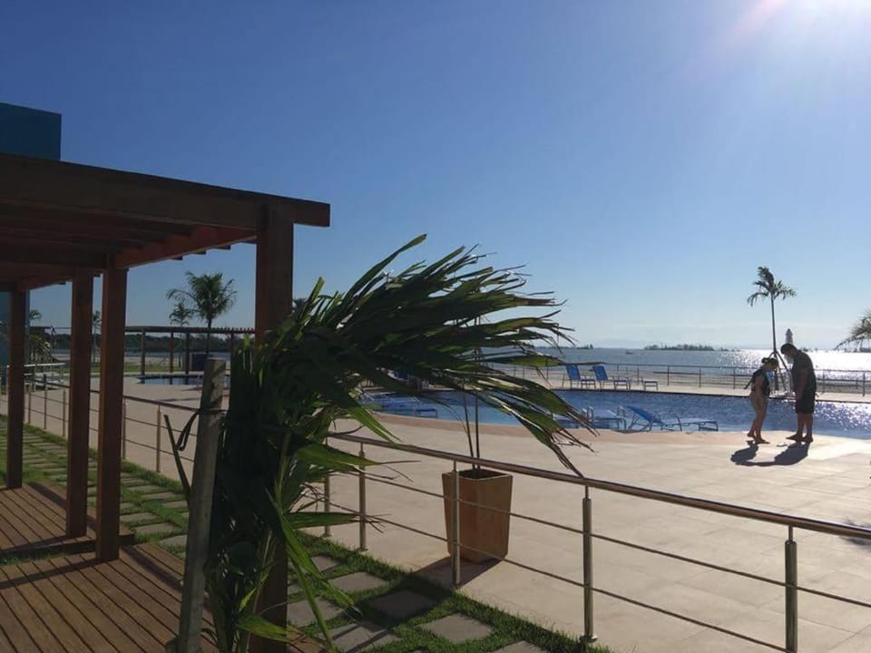 Flat com praia privativa e lazer total em Arraial Apartment in State of Rio de Janeiro