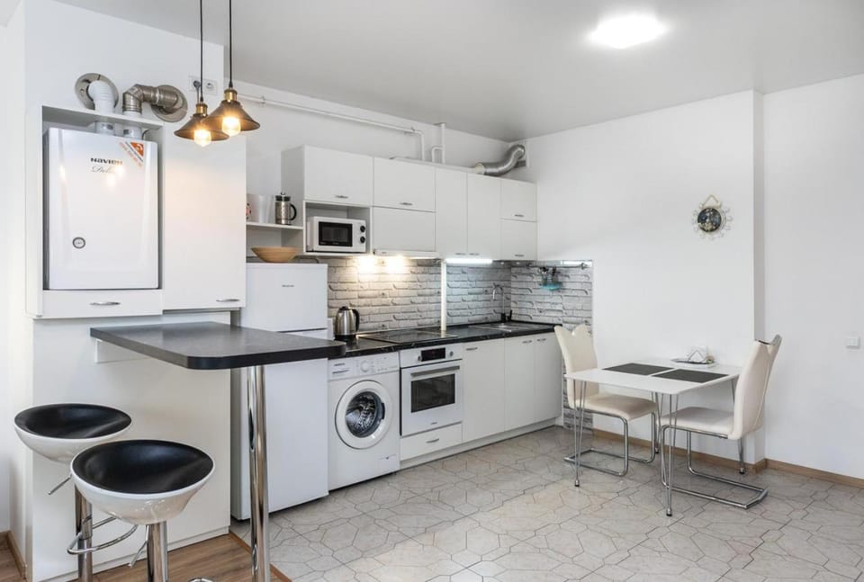 Dining area, oven, stove, toaster, washing machine