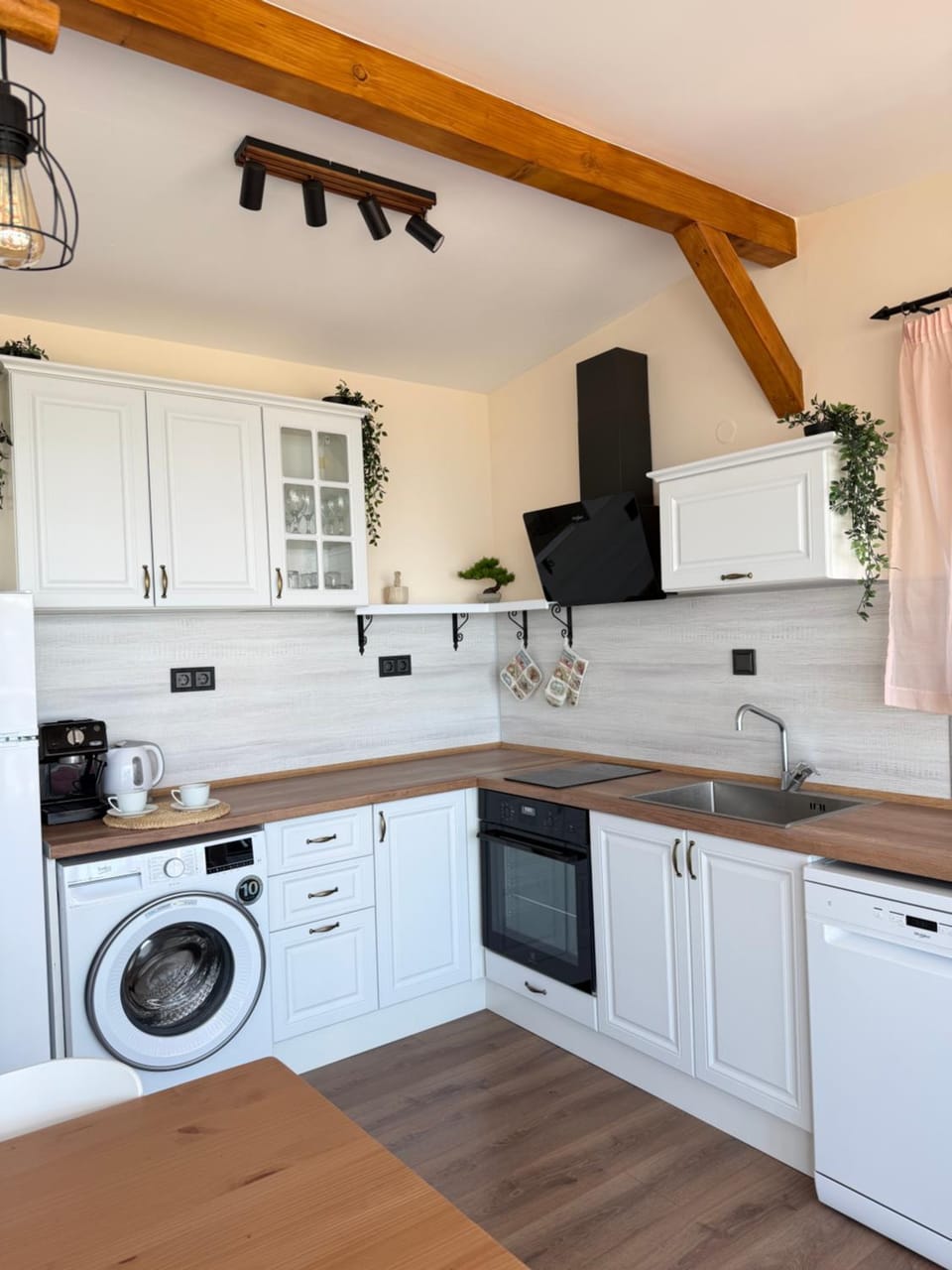 Kitchen or kitchenette, dishwasher, oven, stove, washing machine