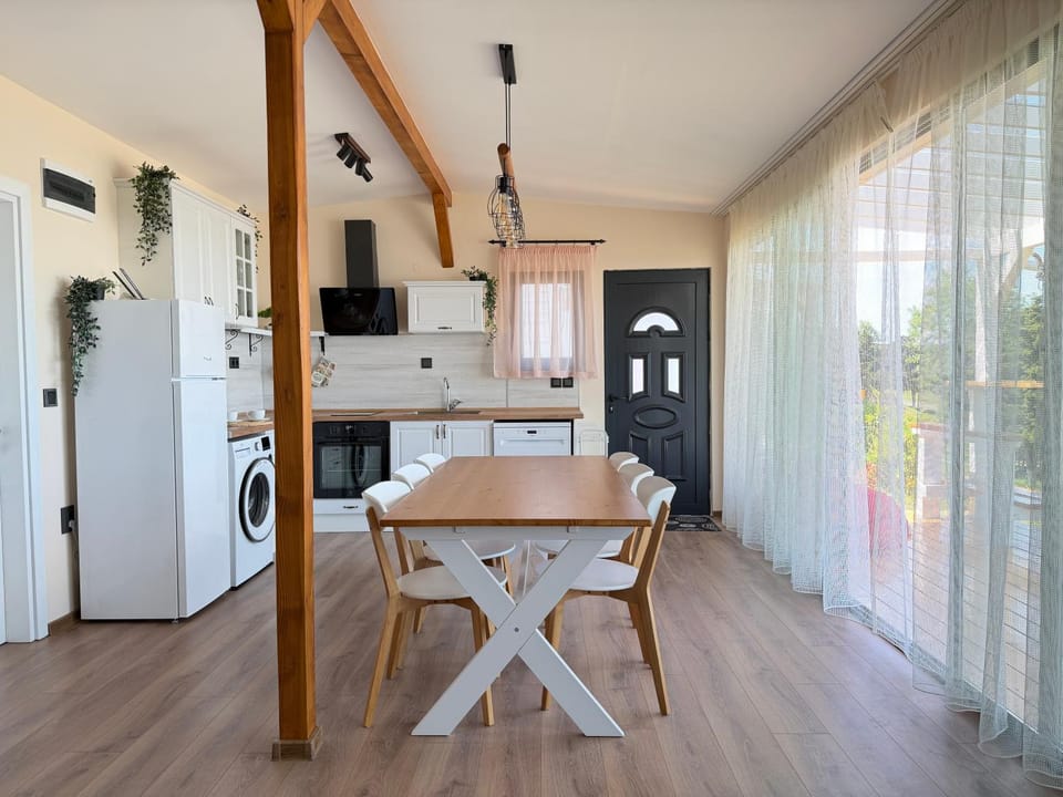 Kitchen or kitchenette, Living room, Dining area, dishwasher, oven, stove, washing machine