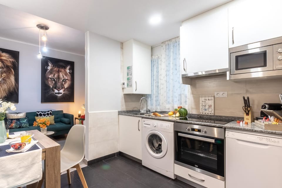 Living room, Dining area, dishwasher, oven, stove, washing machine